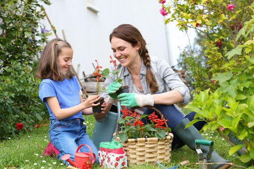 Community gardeners sorting green waste at a local collection point